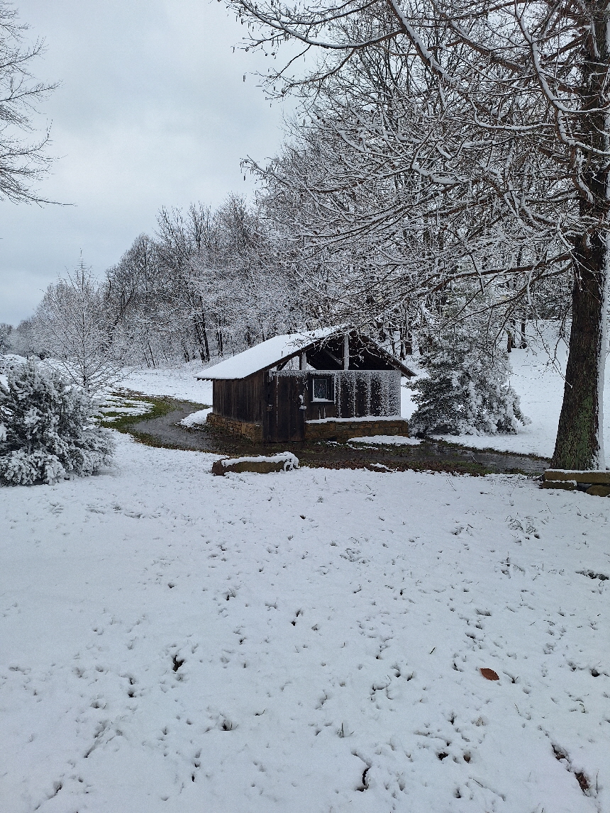 spring house in snow